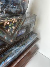 A pair of Chinese cloisonn&eacute; Buddhist lions on a wooden base, 20th C.