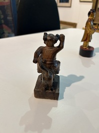 Eight Chinese gilt and polychromed wooden sculptures, 19th/20th C.