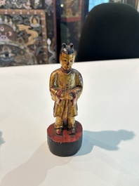 Eight Chinese gilt and polychromed wooden sculptures, 19th/20th C.