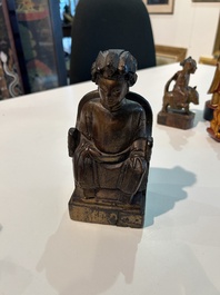 Eight Chinese gilt and polychromed wooden sculptures, 19th/20th C.