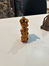 Eight Chinese gilt and polychromed wooden sculptures, 19th/20th C.