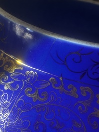 A pair of large Chinese famille rose blue-ground 'dragons and phoenixes' vases with covers, Kangxi mark, 19th C.