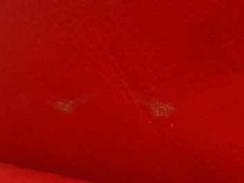 Franz Romero (1951): Een DS-57 Bugatti loungestoel in rood leer en gepolijst aluminium, De Sede, Zwitserland