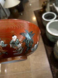 A Chinese coral-red ground famille verte bowl with playing boys, 19th/20th C.