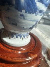 A Chinese blue and white vase with figures in a landscape, Kangxi