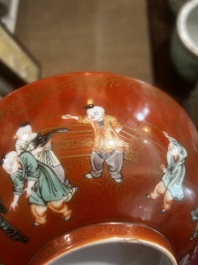 A Chinese coral-red ground famille verte bowl with playing boys, 19th/20th C.