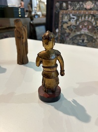 Eight Chinese gilt and polychromed wooden sculptures, 19th/20th C.