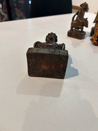 Eight Chinese gilt and polychromed wooden sculptures, 19th/20th C.