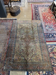 A Persian Kashan 'Mohtashem' silk rug with floral design, early 20th C.