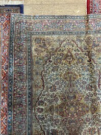 A Persian Kashan 'Mohtashem' silk rug with floral design, early 20th C.