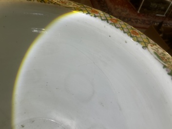 A Chinese famille rose jardini&egrave;re with birds on blossoming branches on an openworked carved wooden stand with marble top, 19th/20th C.