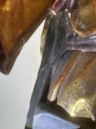 A large polychromed wood sculpture of Saint Elizabeth of Hungary, 18th C.