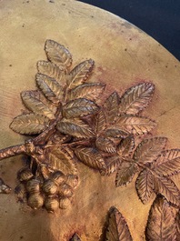Paul Comolera (1813-1890): Plaque &agrave; d&eacute;cor en relief d'un oiseau sur une branche fleurie, bronze dor&eacute;
