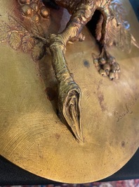 Paul Comolera (1813-1890): Plaque &agrave; d&eacute;cor en relief d'un oiseau sur une branche fleurie, bronze dor&eacute;