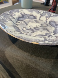 Three Dutch Delft blue and white chinoiserie plates, 17th/18th C.