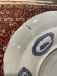 Three Dutch Delft blue and white chinoiserie plates, 17th/18th C.