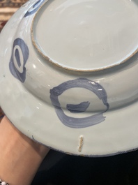 Three Dutch Delft blue and white chinoiserie plates, 17th/18th C.