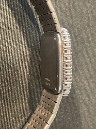 An 18 carat white gold and diamond set Piaget lady's cocktail watch, 20th C.