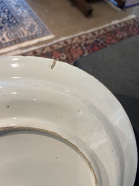 Three Dutch Delft blue and white chinoiserie plates, 17th/18th C.