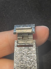 An 18 carat white gold and diamond set Piaget lady's cocktail watch, 20th C.