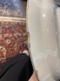 Three Dutch Delft blue and white chinoiserie plates, 17th/18th C.