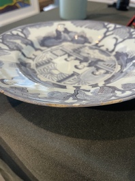 Three Dutch Delft blue and white chinoiserie plates, 17th/18th C.