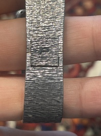 An 18 carat white gold and diamond set Piaget lady's cocktail watch, 20th C.