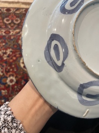 Three Dutch Delft blue and white chinoiserie plates, 17th/18th C.