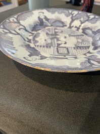 Three Dutch Delft blue and white chinoiserie plates, 17th/18th C.