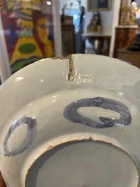 Three Dutch Delft blue and white chinoiserie plates, 17th/18th C.