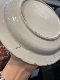 Three Dutch Delft blue and white chinoiserie plates, 17th/18th C.