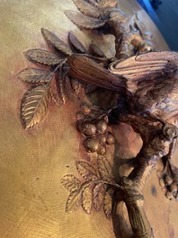 Paul Comolera (1813-1890): Plaque &agrave; d&eacute;cor en relief d'un oiseau sur une branche fleurie, bronze dor&eacute;
