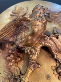 Paul Comolera (1813-1890): Plaque &agrave; d&eacute;cor en relief d'un oiseau sur une branche fleurie, bronze dor&eacute;