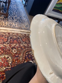 Three Dutch Delft blue and white chinoiserie plates, 17th/18th C.