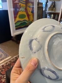 Three Dutch Delft blue and white chinoiserie plates, 17th/18th C.