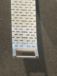 An 18 carat white gold and diamond set Piaget lady's cocktail watch, 20th C.