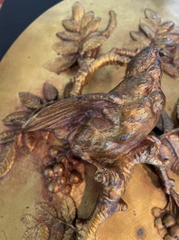 Paul Comolera (1813-1890): Plaque &agrave; d&eacute;cor en relief d'un oiseau sur une branche fleurie, bronze dor&eacute;