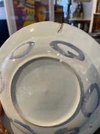 Three Dutch Delft blue and white chinoiserie plates, 17th/18th C.