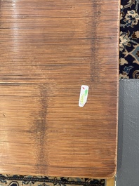 A Chinese bamboo and hardwooden opium table, 20th C.