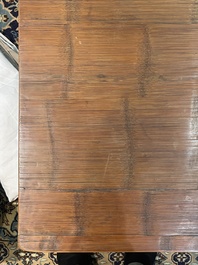 A Chinese bamboo and hardwooden opium table, 20th C.