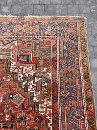 Een Perzisch Heriz tapijt met floraal decor, wol op katoen, 20ste eeuw