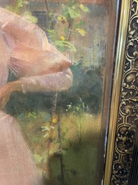 Louise De Hem (1866-1922): Portrait of a lady in a pink dress with a flower in her hand in a garden, pastel on paper marouflated on canvas