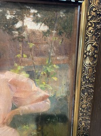 Louise De Hem (1866-1922): Portrait of a lady in a pink dress with a flower in her hand in a garden, pastel on paper marouflated on canvas