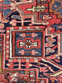 Een Perzisch Heriz tapijt met floraal decor, wol op katoen, 20ste eeuw