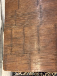 A Chinese bamboo and hardwooden opium table, 20th C.