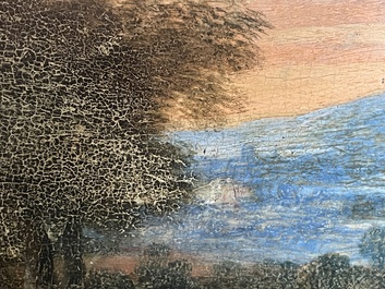 Flemish school: Two travelers and a donkey in a landscape, oil on panel, 17th C.