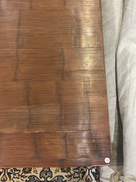 A Chinese bamboo and hardwooden opium table, 20th C.