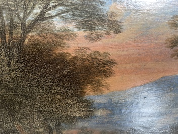 Flemish school: Two travelers and a donkey in a landscape, oil on panel, 17th C.