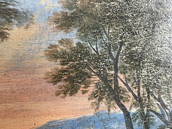 Flemish school: Two travelers and a donkey in a landscape, oil on panel, 17th C.