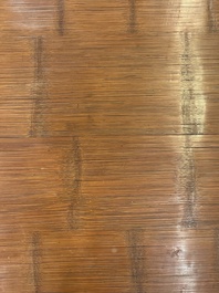 A Chinese bamboo and hardwooden opium table, 20th C.